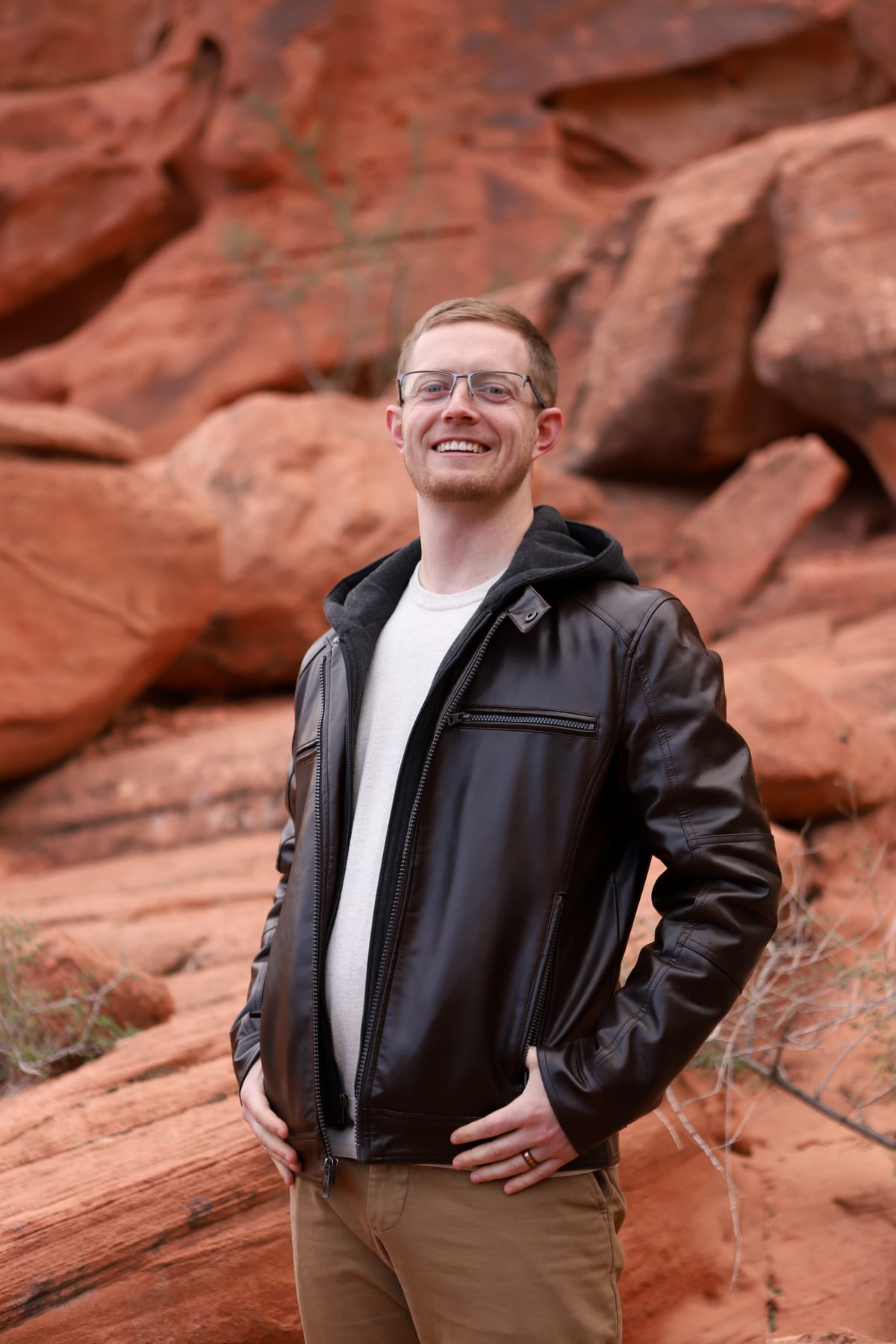 Jonathan Engle standing in the red rock of the Utah desert